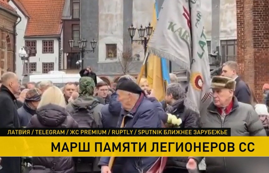 В Латвии на марше памяти легионеров СС задержали депутата с антифашистским лозунгом