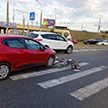 В Минске под колеса авто попала велосипедистка, которая перевозила в специальном кресле ребенка